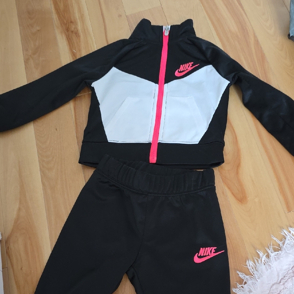 Nike Black and White Tracksuit with Pink Accents
